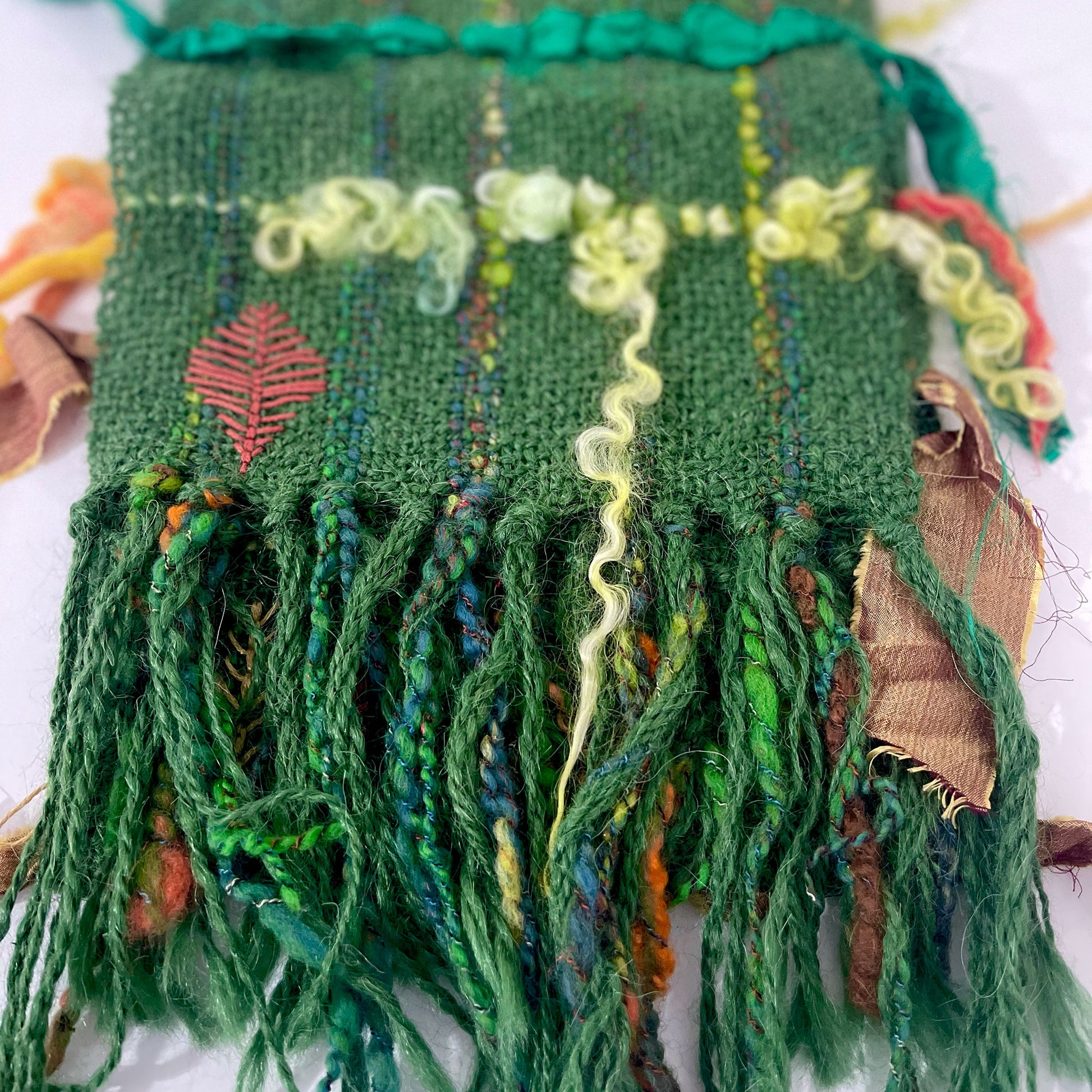 Hand woven alpaca, wool and silk table runner with hand embroidery by Penberth Yarns.