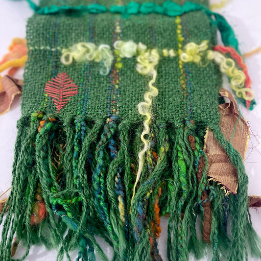 Hand woven alpaca, wool and silk table runner with hand embroidery by Penberth Yarns.