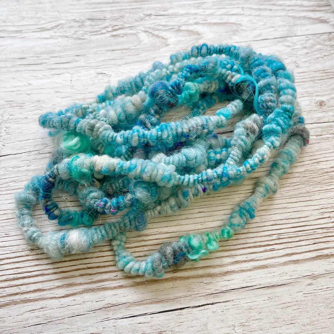 coiled art yarns