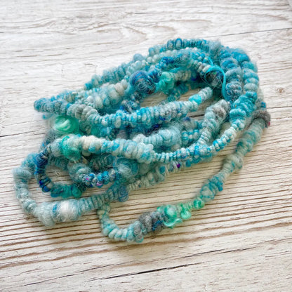 coiled art yarns